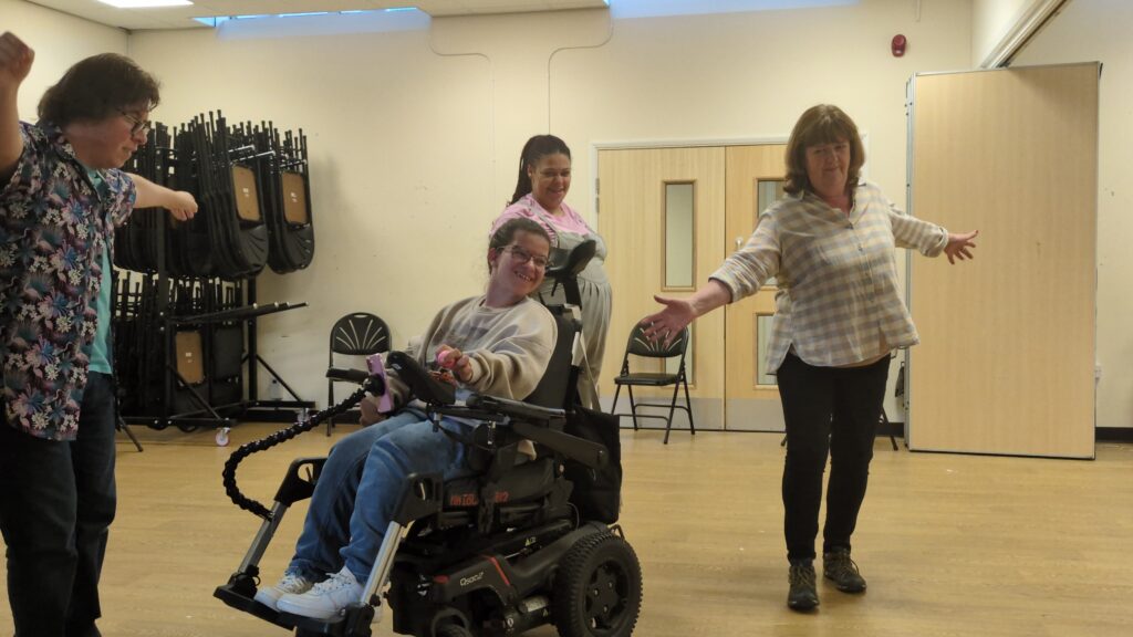 A group of young people dancing